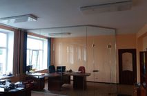 UALCOM Company realized the office of the head of a large trading company with glass interior.
