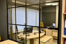 UALCOM implemented a project to install UALCOM Crystal office partitions for a modern engineering and construction office.
