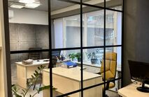 UALCOM implemented a project to install UALCOM Crystal office partitions for a modern engineering and construction office.
