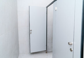 Sanitary partitions in project The classic design of the office space for a dealer of world manufacturers of agricultural machinery.