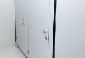 Sanitary partitions in project The classic design of the office space for a dealer of world manufacturers of agricultural machinery.